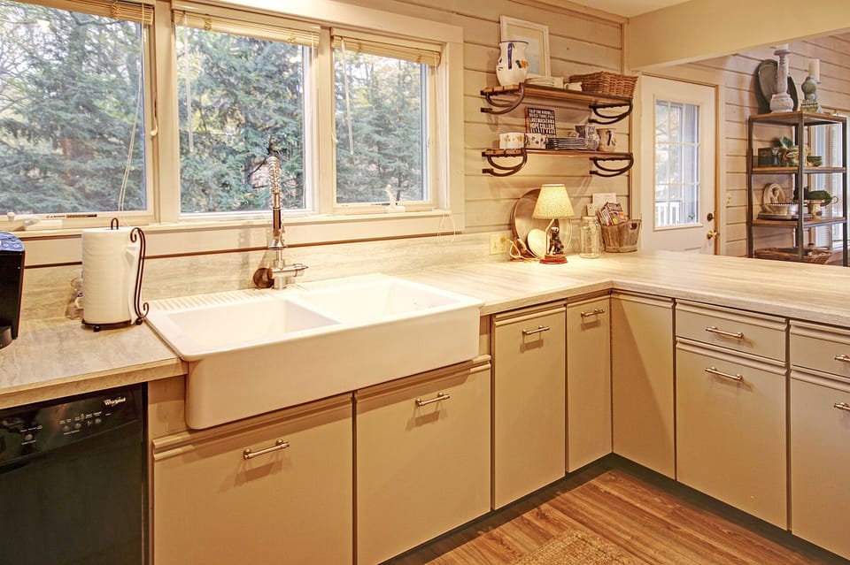 farmhouse sink in newly renovated kitchen