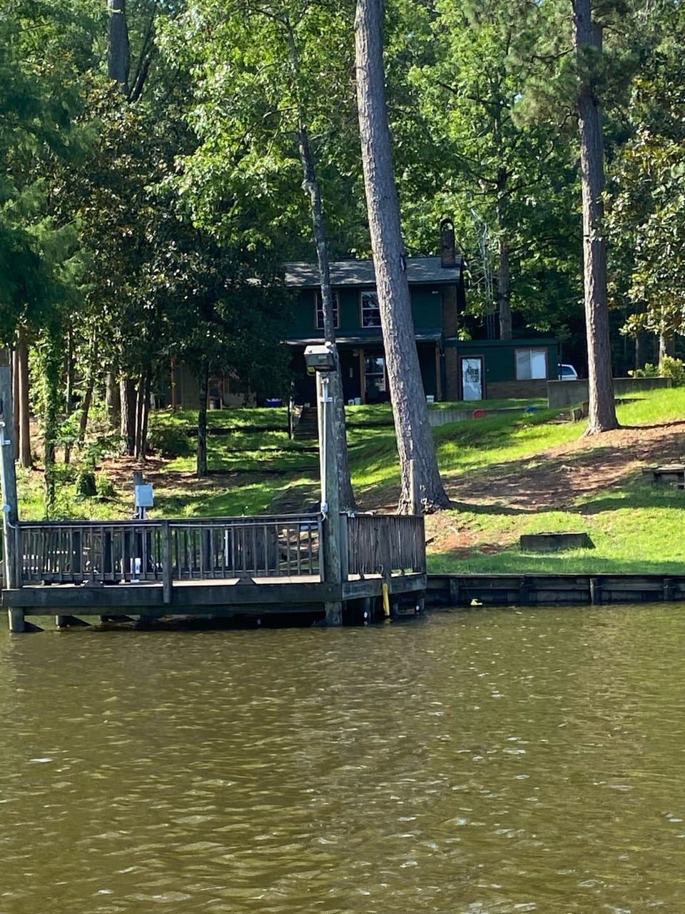 View from the lake showing the pier and lights for night fishing.