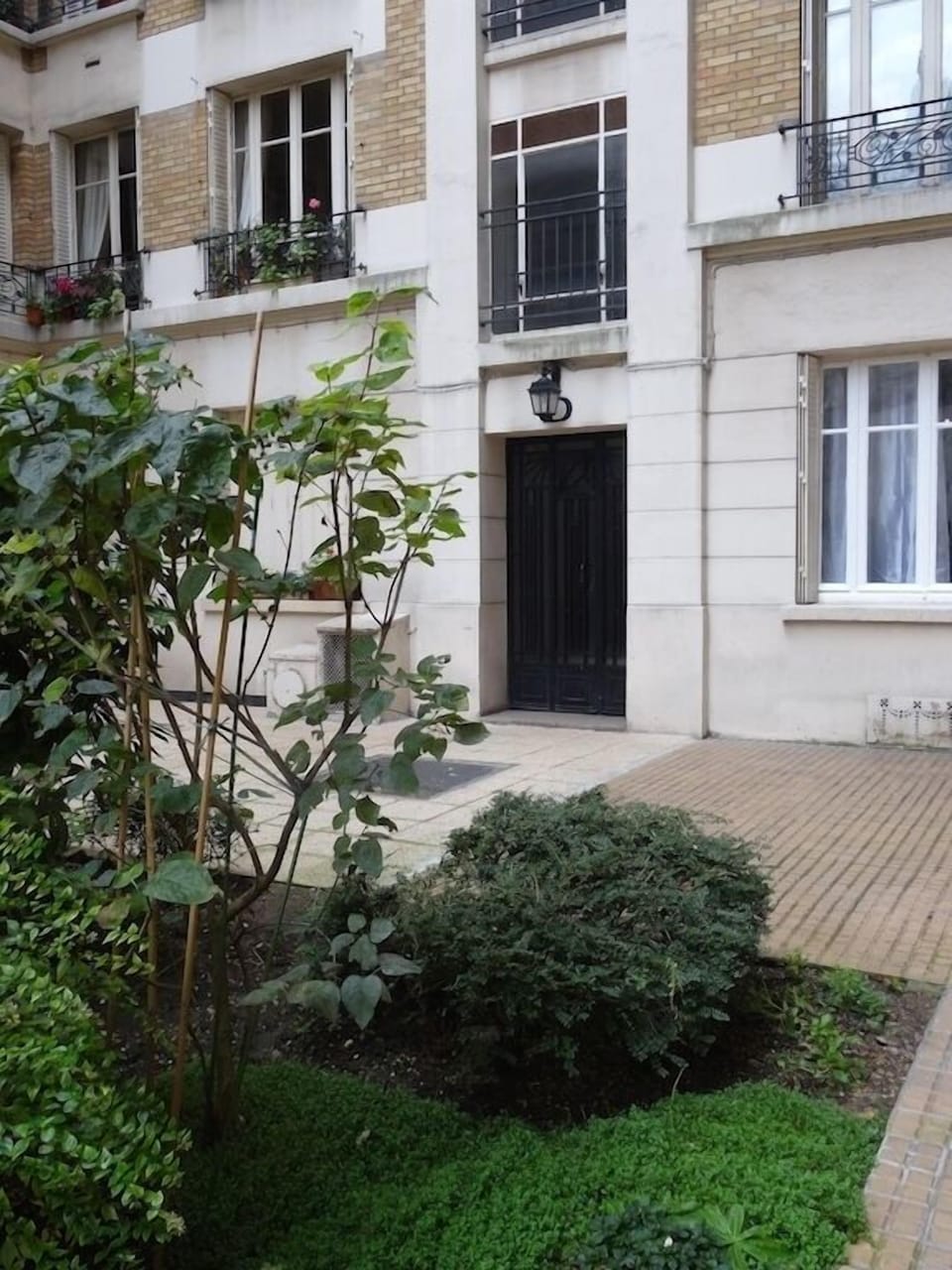 The front door to the apartment building. 