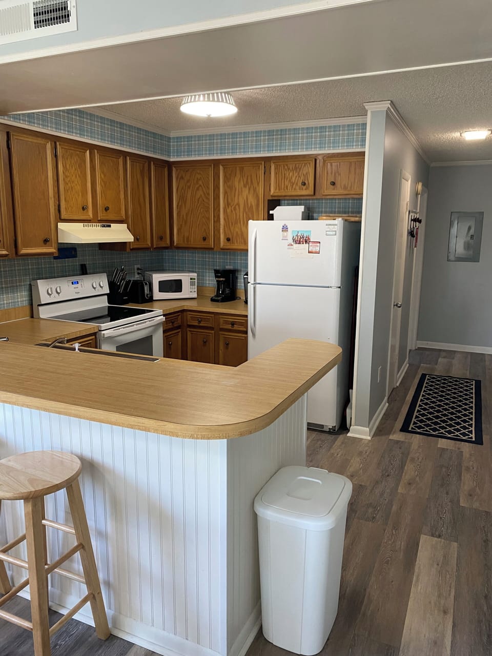 Kitchen with oven, refrigerator, dishwasher, microwave, toaster & coffee maker