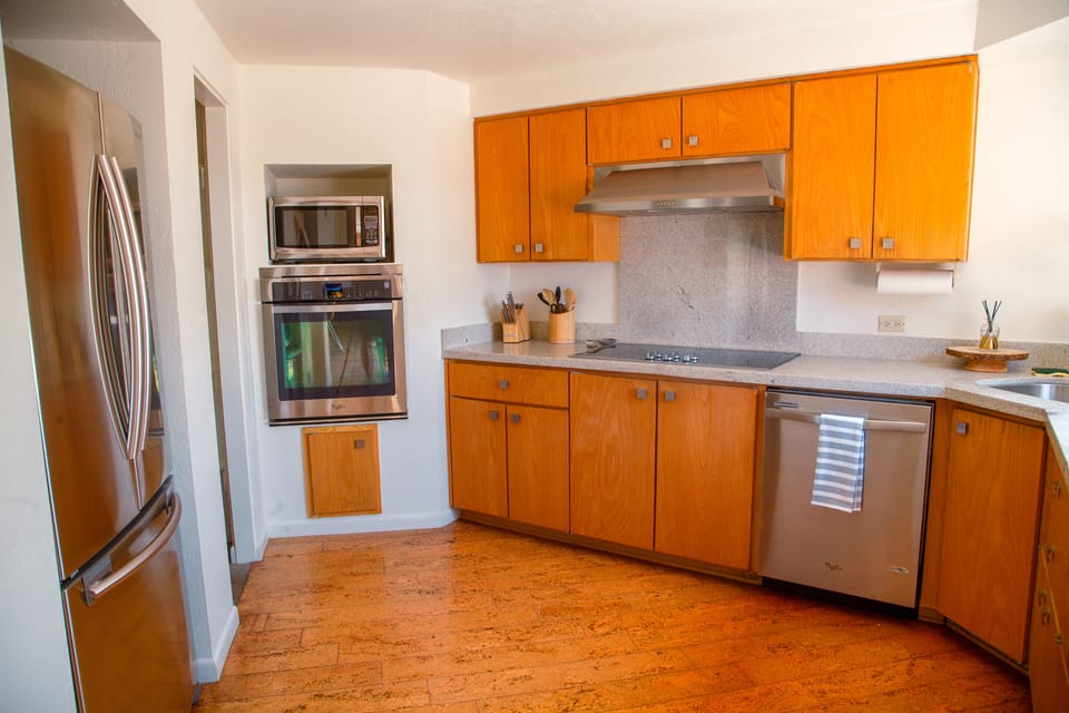 Custom cabinetry and a unique room shape make this kitchen one of a kind.