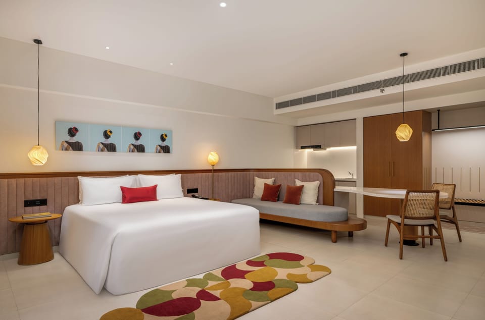 Studio M | Premium bedding, down comforters, pillowtop beds, minibar