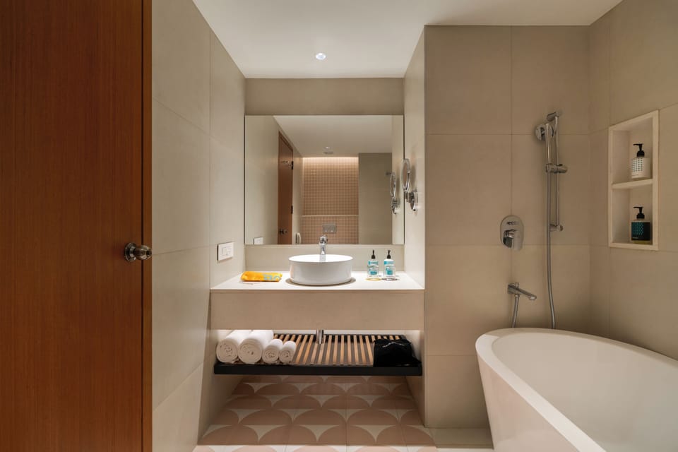 Studio M | Bathroom | Shower, rainfall showerhead, free toiletries, hair dryer