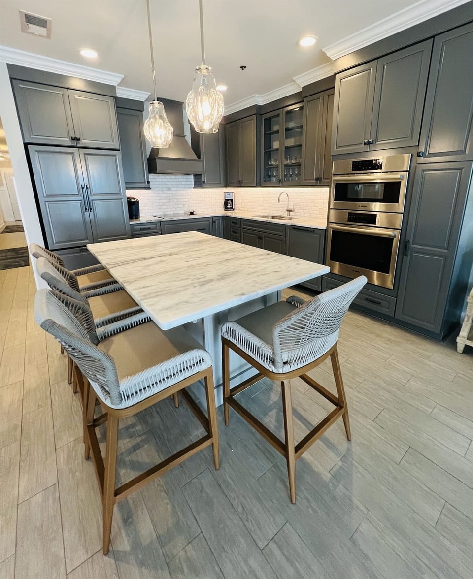 Another view of kitchen with seating area for 4 . .