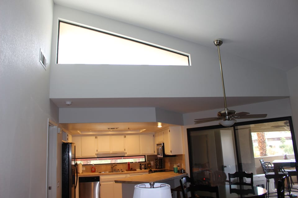 Vaulted ceiling with skylight.