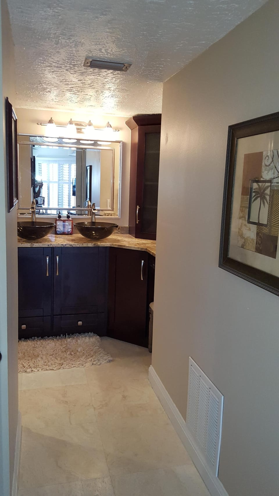 New Master Bath with double sinks in dressing area and walk-in closet.