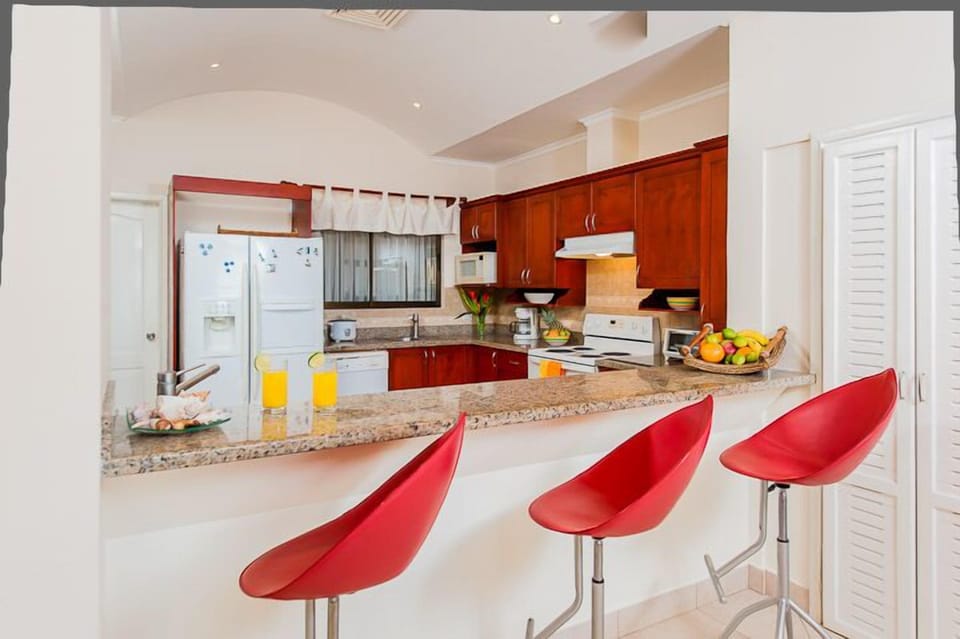 The kitchen is immense, with  appliances and accouterments for our best chefs. 