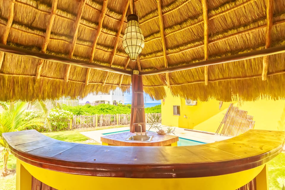 Have a cold drink at the shaded Palapa while enjoying a sunny day at the pool