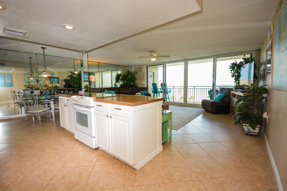 huge open kitchen area overlooking Family Room and pool/beach
