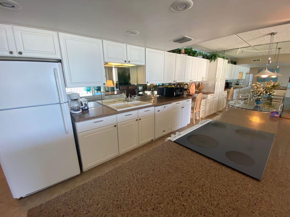 Full kitchen with most everything you need for your vacation