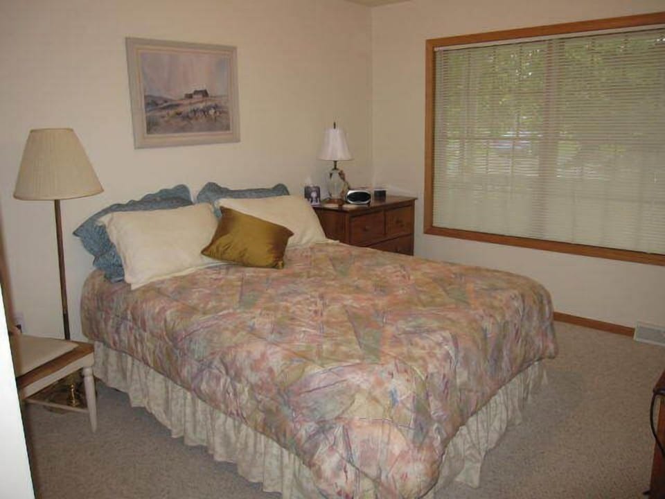 The guest bedroom is at the front of the home and features cable TV