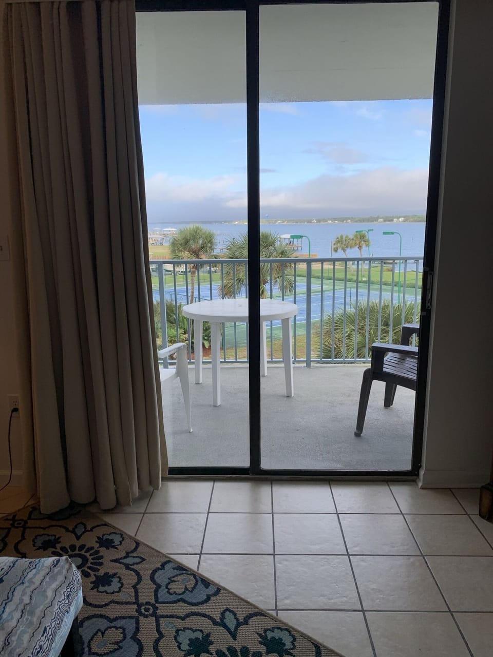 balcony view from kitchen counter ...tennis courts and Little Lagoon....
