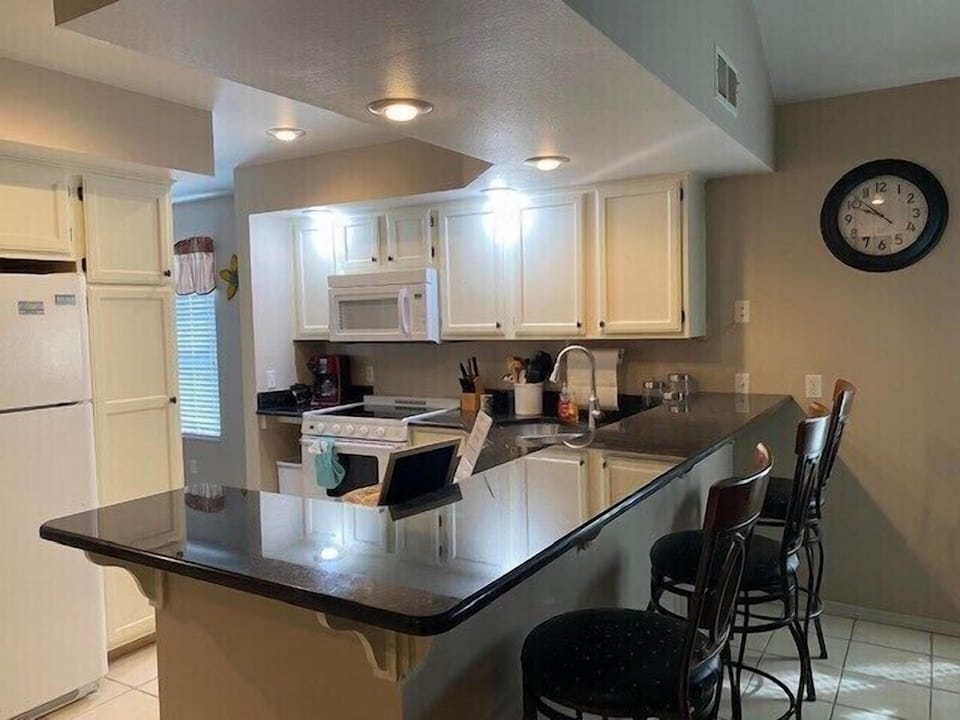 Kitchen overlooks living room 