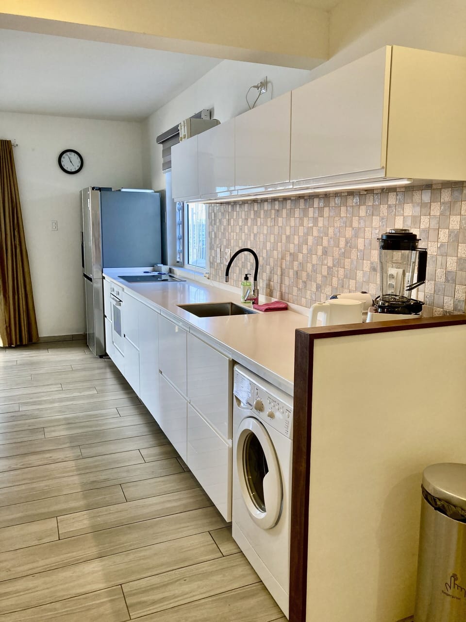 Apartment # A, downstairs.