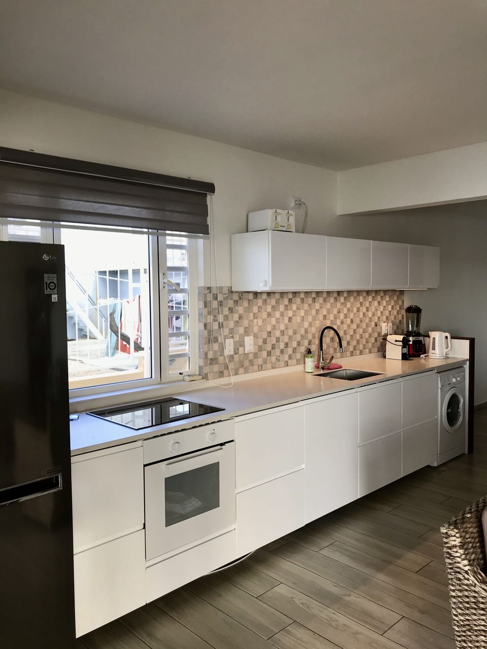 Apartment # A, downstairs.