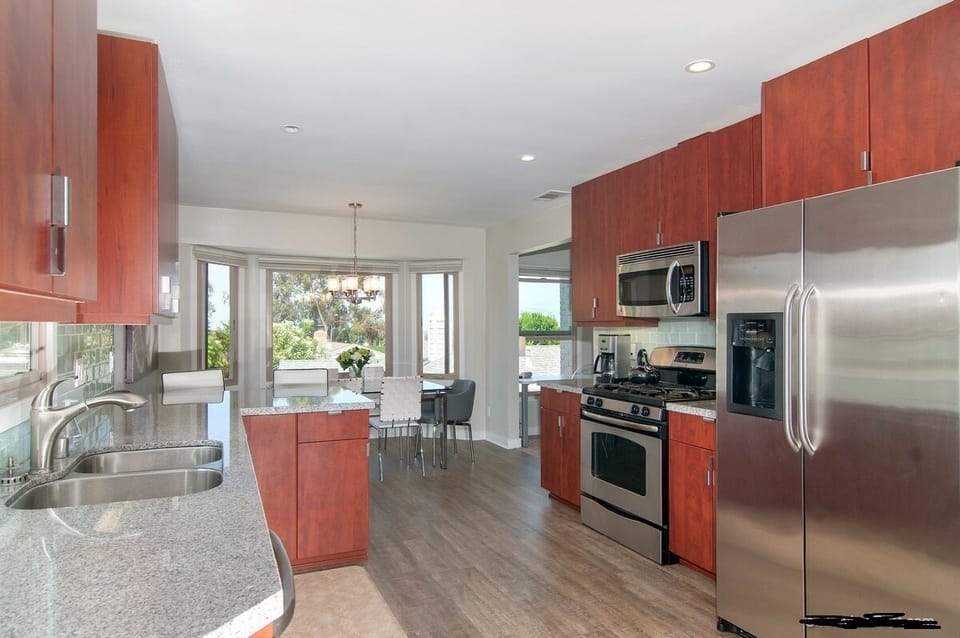 Lots of Natural Light In Kitchen and Dining Area