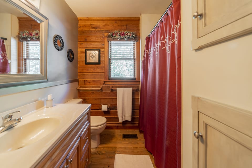 Bathroom with tub/shower combo off main level.