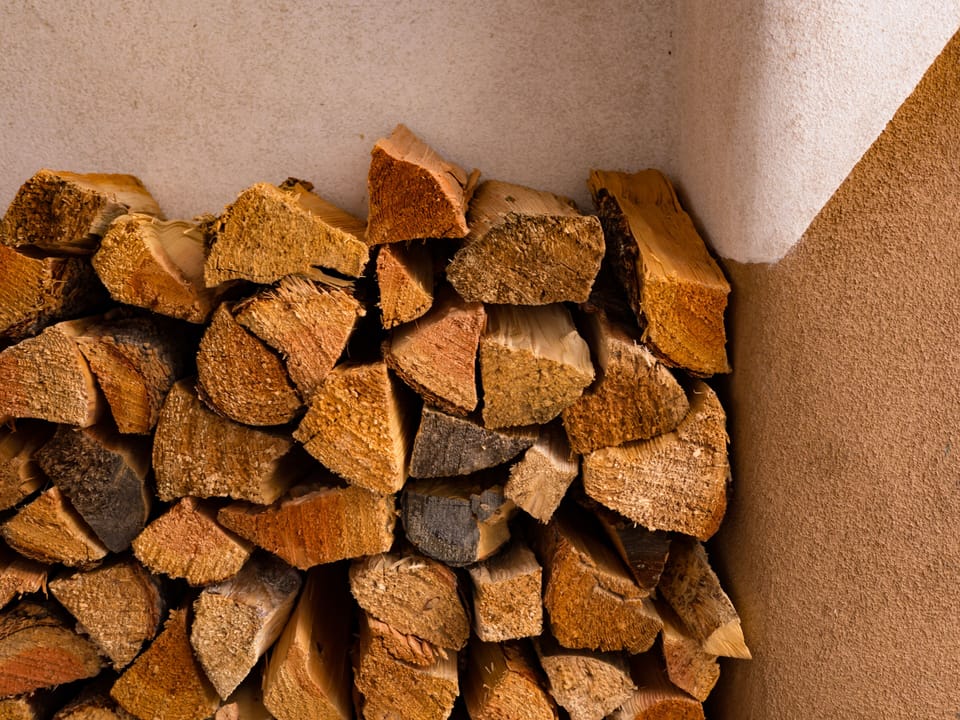 Complimentary firewood stacked at your door
