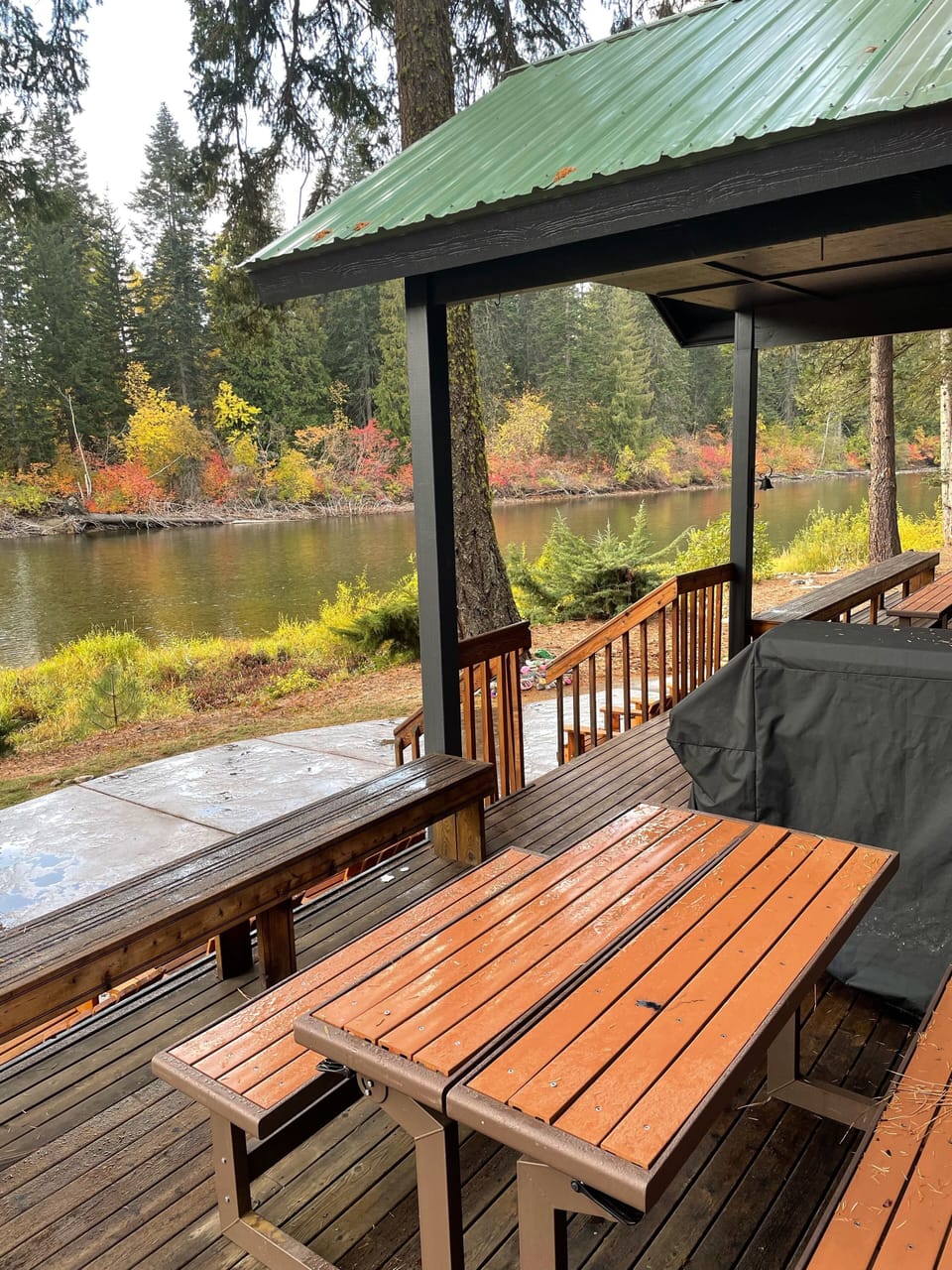 Weber BBQ on deck facing river.