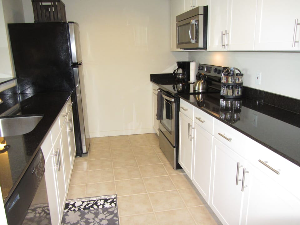 Kitchen with granite counters, and stainless appliances