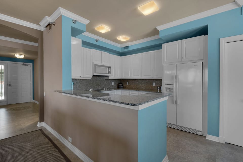Kitchen with new appliances and stand alone ice maker