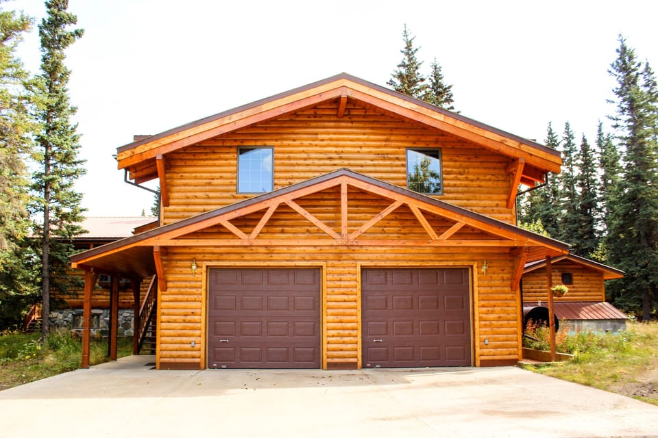 Our home.  The two windows above the garage are the rental bedrooms.
