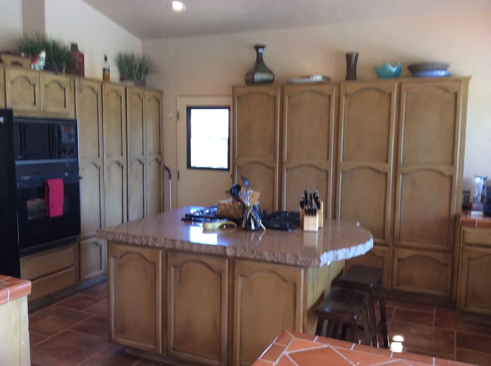 Kitchen cabinets & back door.