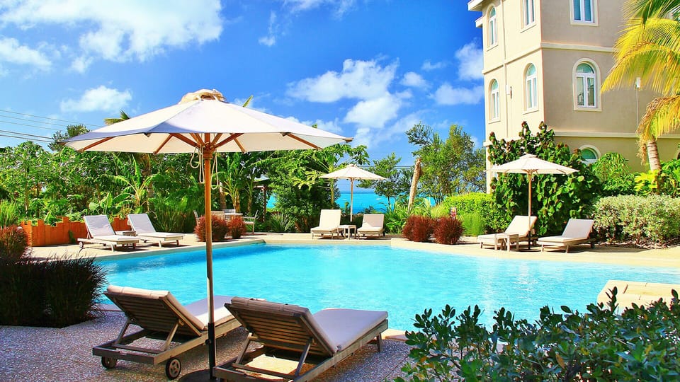 The large pool and deck is a great place to relax after a day at the beach.