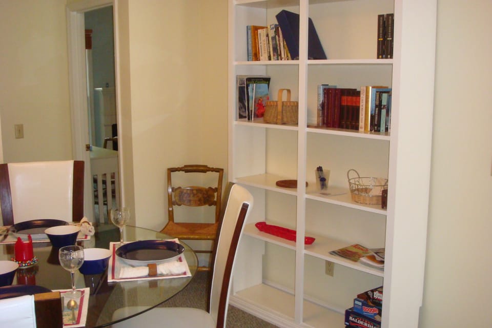 Book case with games, books and historical information on area