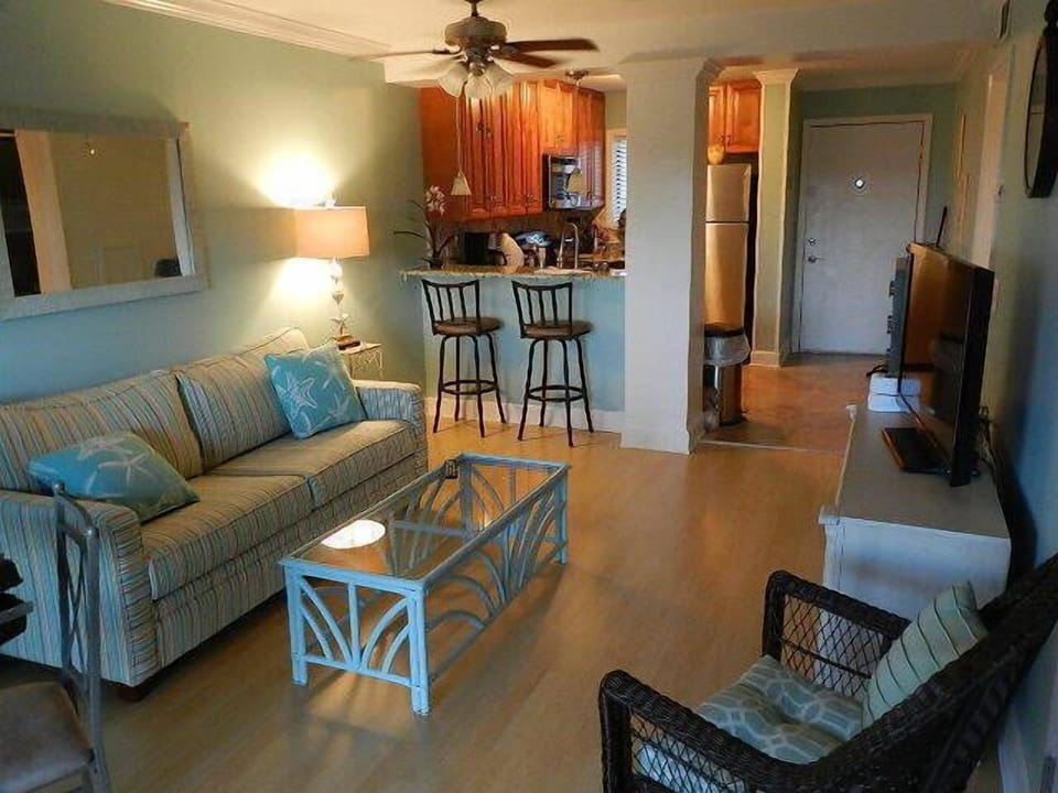 Sleeper sofa in main room - with flat screen TV. Breakfast bar with granite top.