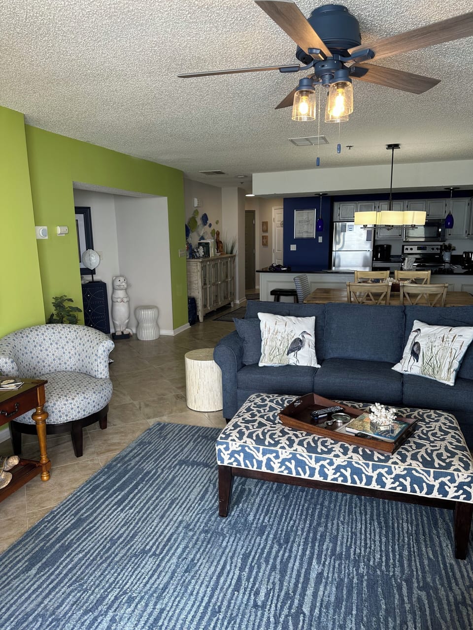 Living Room with large kitchen in background