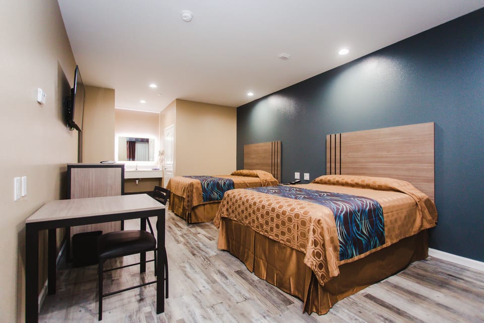 Basic Double Room, 2 Queen Beds, Non Smoking | Pillowtop beds, individually decorated, individually furnished, desk