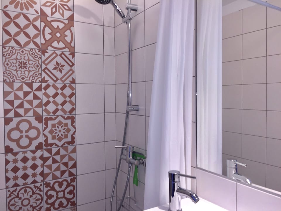 One of three bathrooms