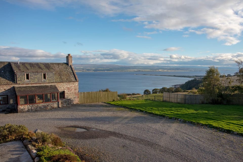 Outside views showing Farmhouse and the views over the Moray Firth.

