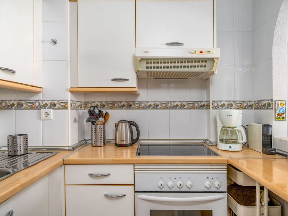 Cabinetry, Countertop, Property, Kitchen Sink, Kitchen, Kitchen Stove, Kitchen Appliance, Home Appliance, Drawer, Interior Design