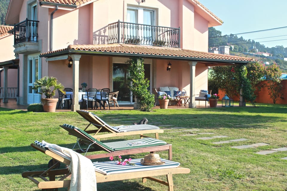 Beautiful house with large private garden completely fenced next to the beach
