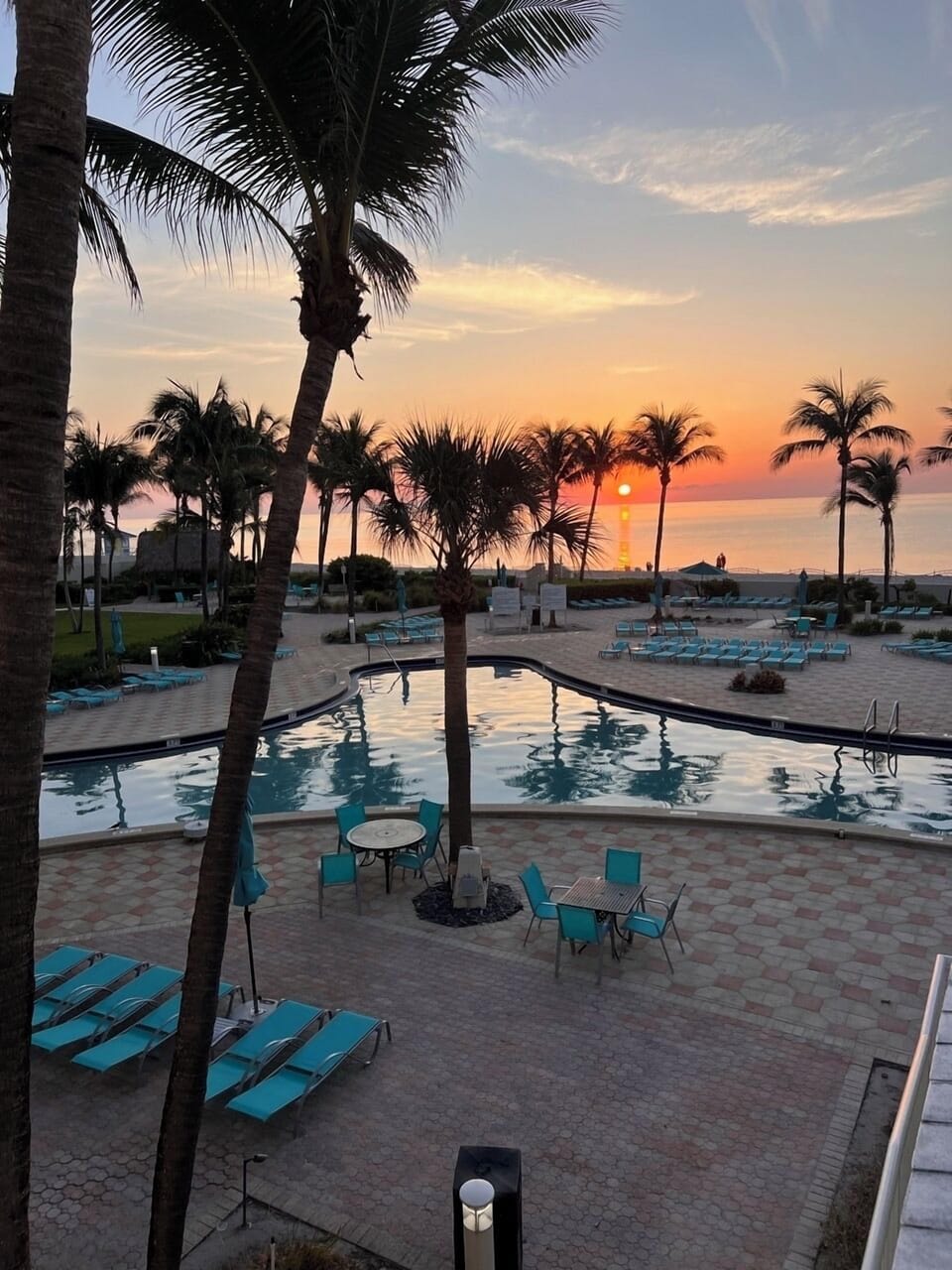 Plenty of Poolside Lounge Chairs and Tables 