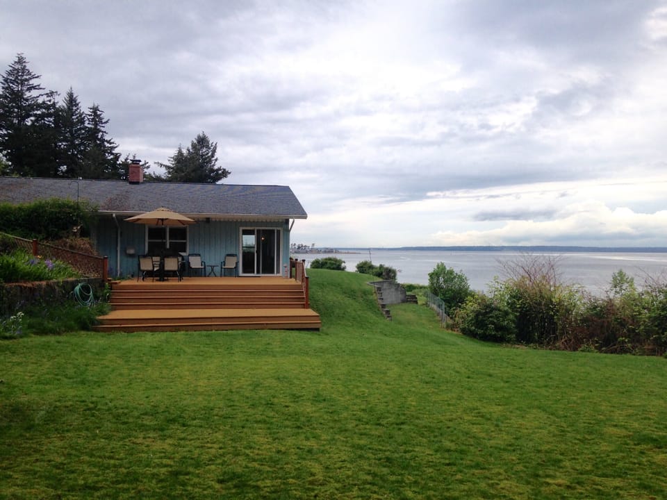 Large deck and yard are opportunities to enjoy the view.