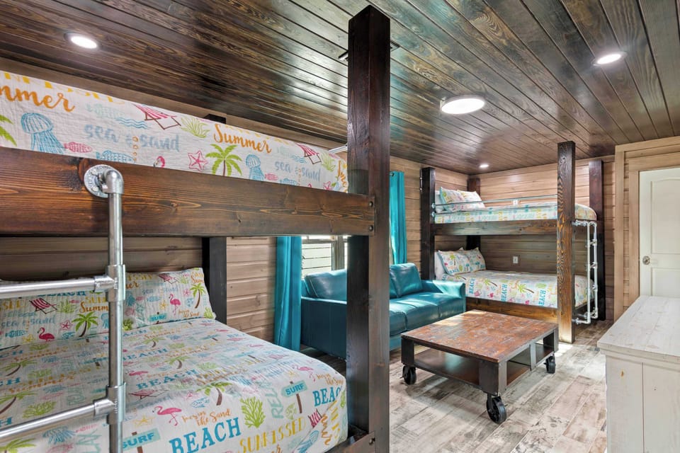 Fun bunk room w/ playful decor & space to unwind.