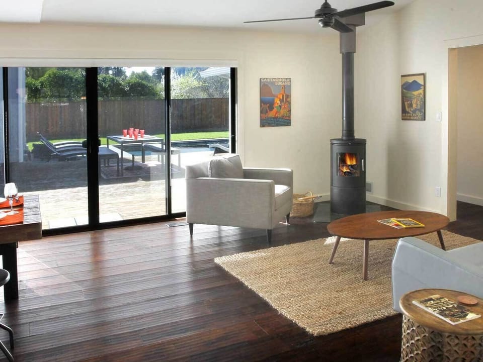 Great room w/conversation space & wood burning stove; kindling & wood provided.