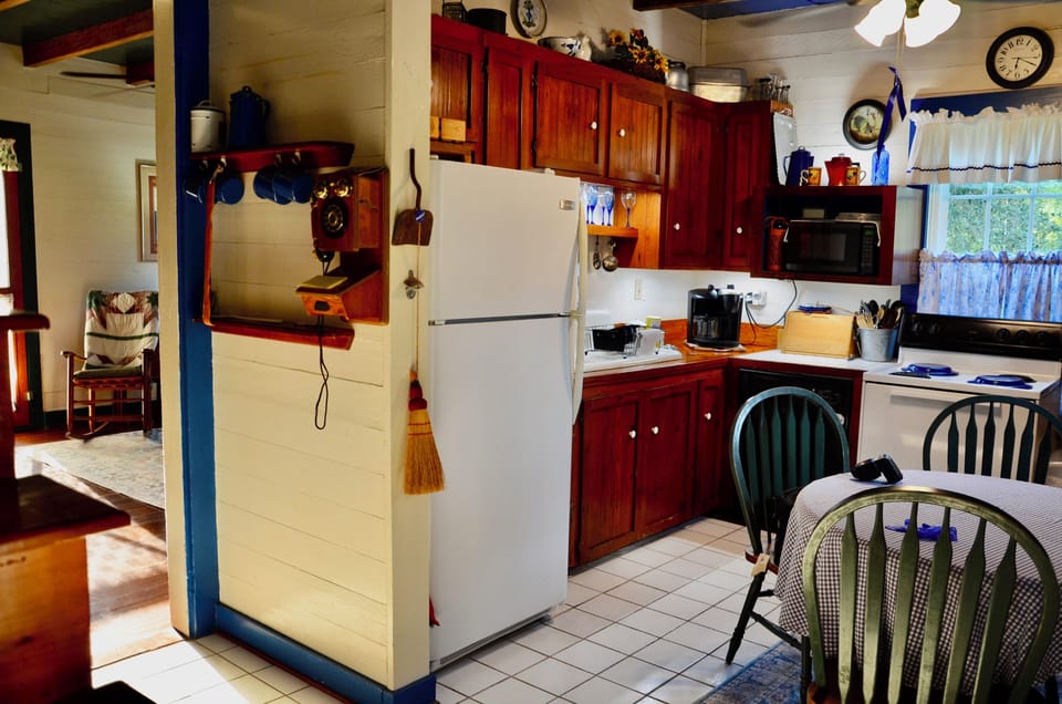 Kitchen from entry door in rear of house.