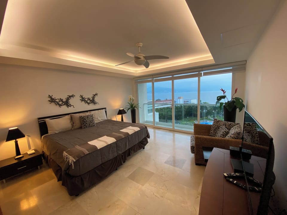 KING BED - MASTER BEDROOM - PRIVATE BALCONY & WATER VIEWS