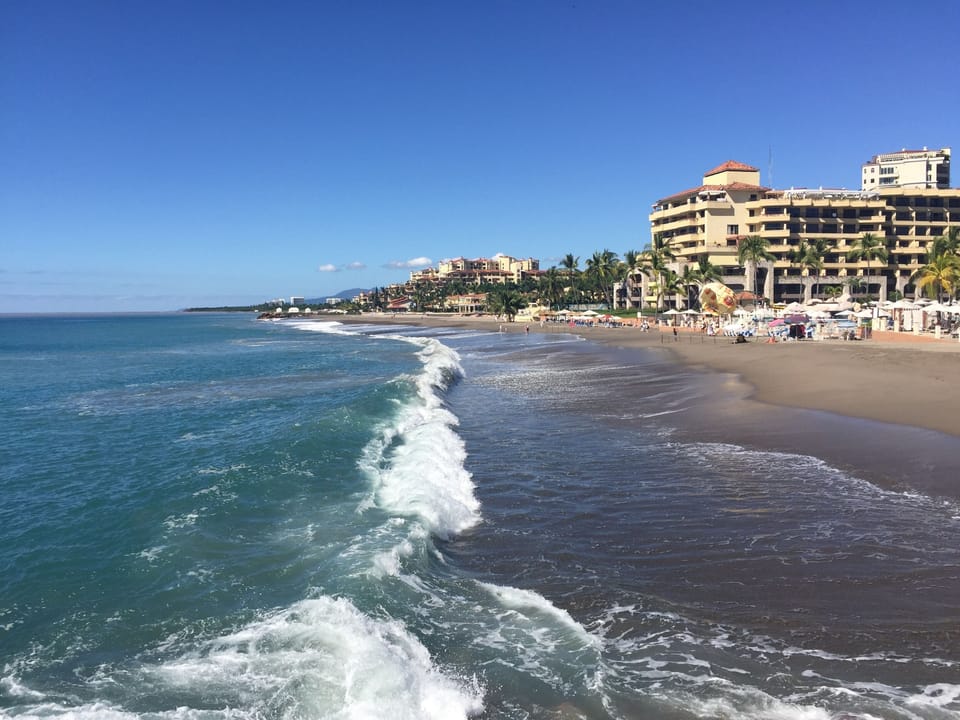 ENJOYING OCEAN WAVES IN FRONT OF THE CONDO - TIME FOR A WALK ON THE BEACH