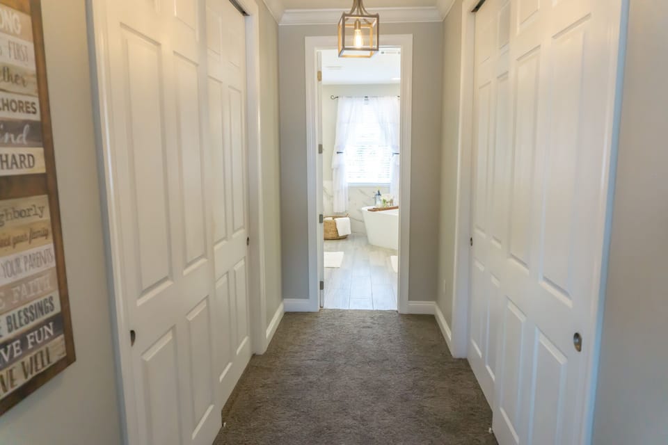 His and her closets leading into the impressive master bath