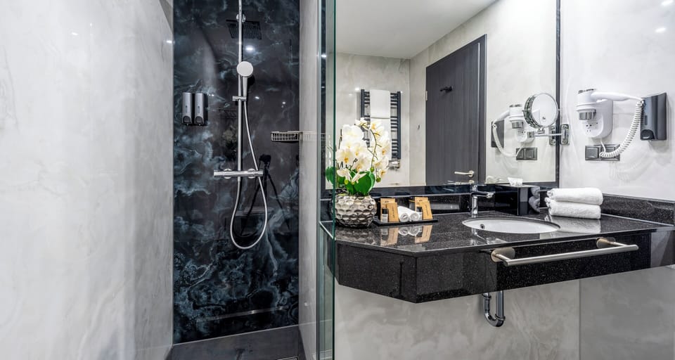 Standard Double Room (Lake Side) | Bathroom | Shower, rainfall showerhead, hair dryer, slippers