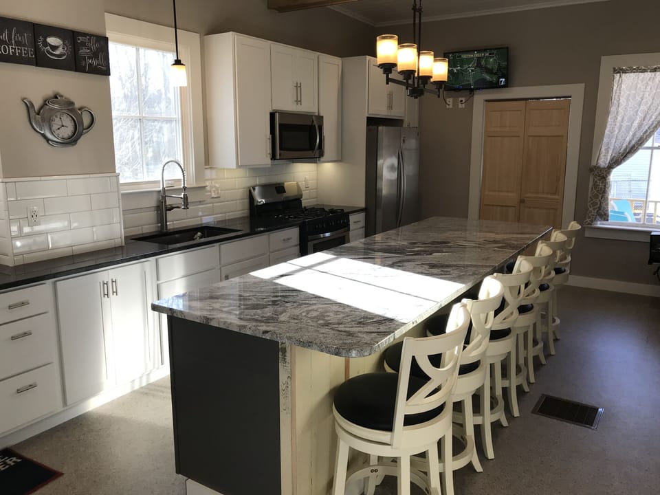 Beautiful kitchen with 5 burner gas stove. 
