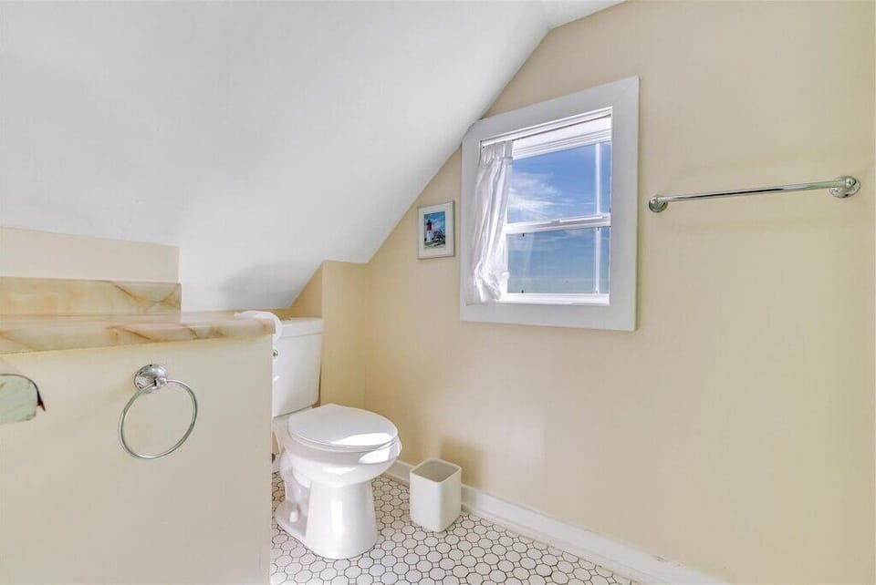 Upstairs full bath. Bathtub not pictured. 