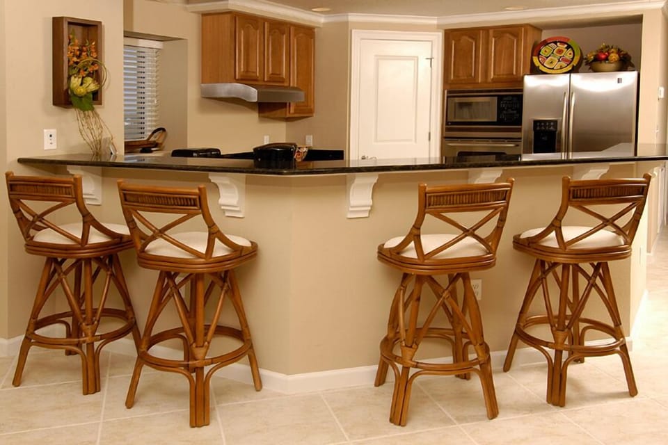 View of the kitchen and granite breakfast bar