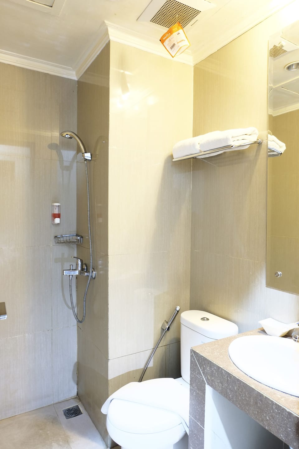 Shower, free toiletries, slippers