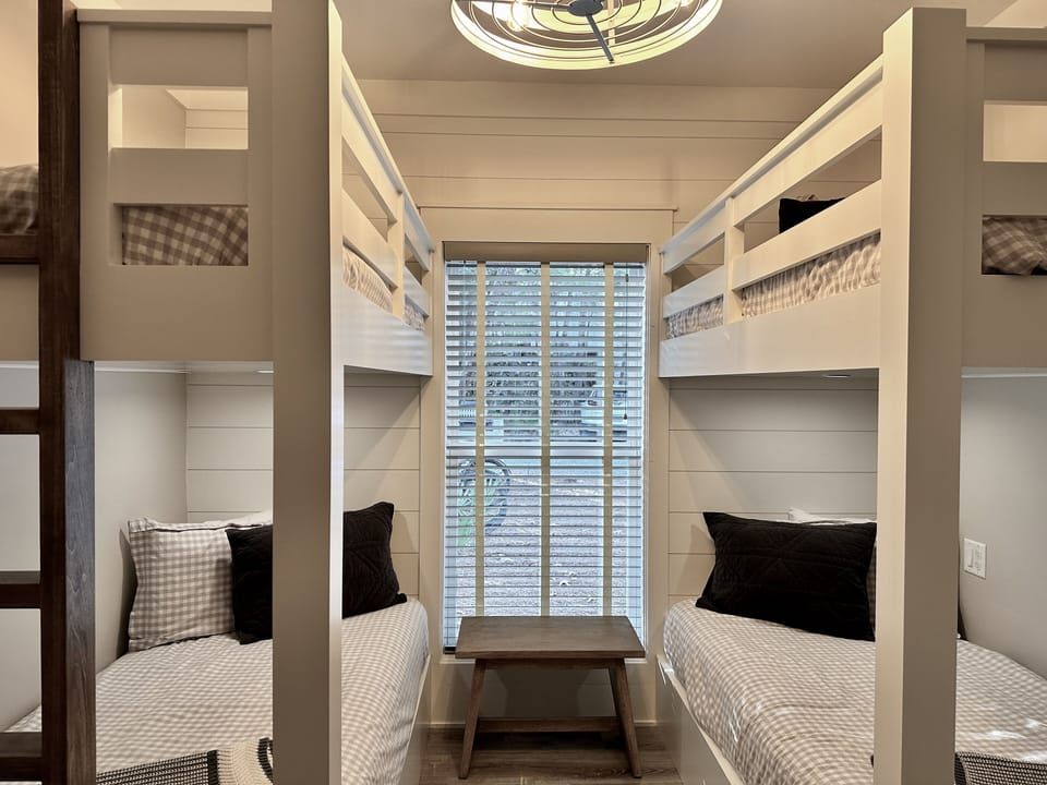 The bunk room also has a large organized closet.